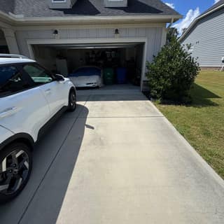 Driveway and garage cleared after a furniture pickup in Charlotte